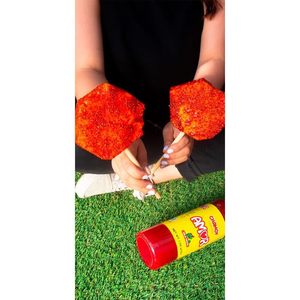 Amor Chamoy Sauce  Bittersweet flavor  2500 Scoville level Enjoy it with fruits veggies snacks and drinks  Kosher  33 fl oz bottle Pack of 1