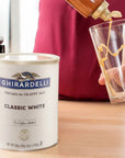 Ghirardelli Classic White Premium Frappé Mix 312 lb Can with Ghirardelli Stamped Barista Spoon