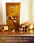 Lindt Nuxor Milk Chocolate Candy Chocolate with Whole Roasted Hazelnuts 58 oz Box