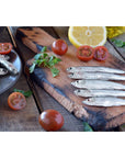 Season Anchovies in Olive Oil  Flat Anchovy Fillets Wild Caught Fish Keto Snacks Canned Anchovies Rich in B Vitamins Low in Mercury Kosher NonGMO 600mg of Omega3  2 Ounce 12Pack