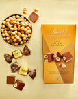 Lindt Nuxor Milk Chocolate Candy Chocolate with Whole Roasted Hazelnuts 58 oz Box